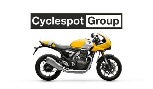 Yellow and black 2026 Triumph Thruxton 400 cafe racer motorcycle with 'Cyclespot Group' logo above it on a white background