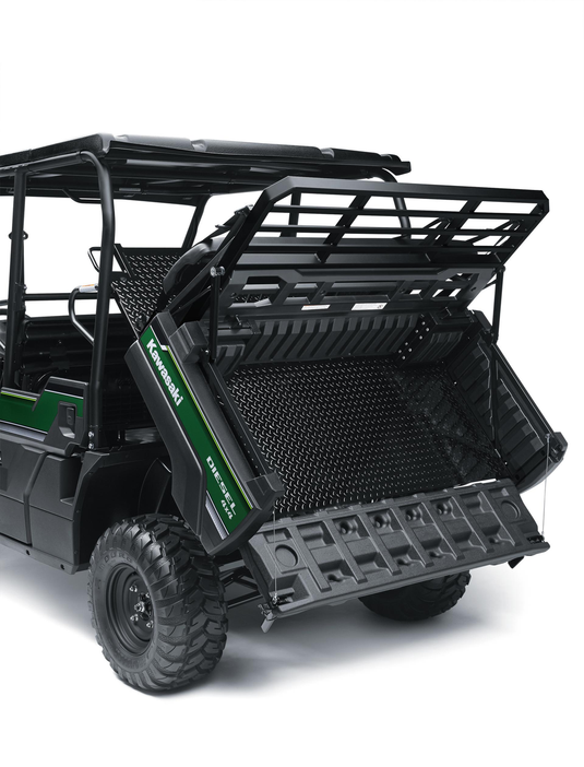 Green utility vehicle with a bed cover on a white background
